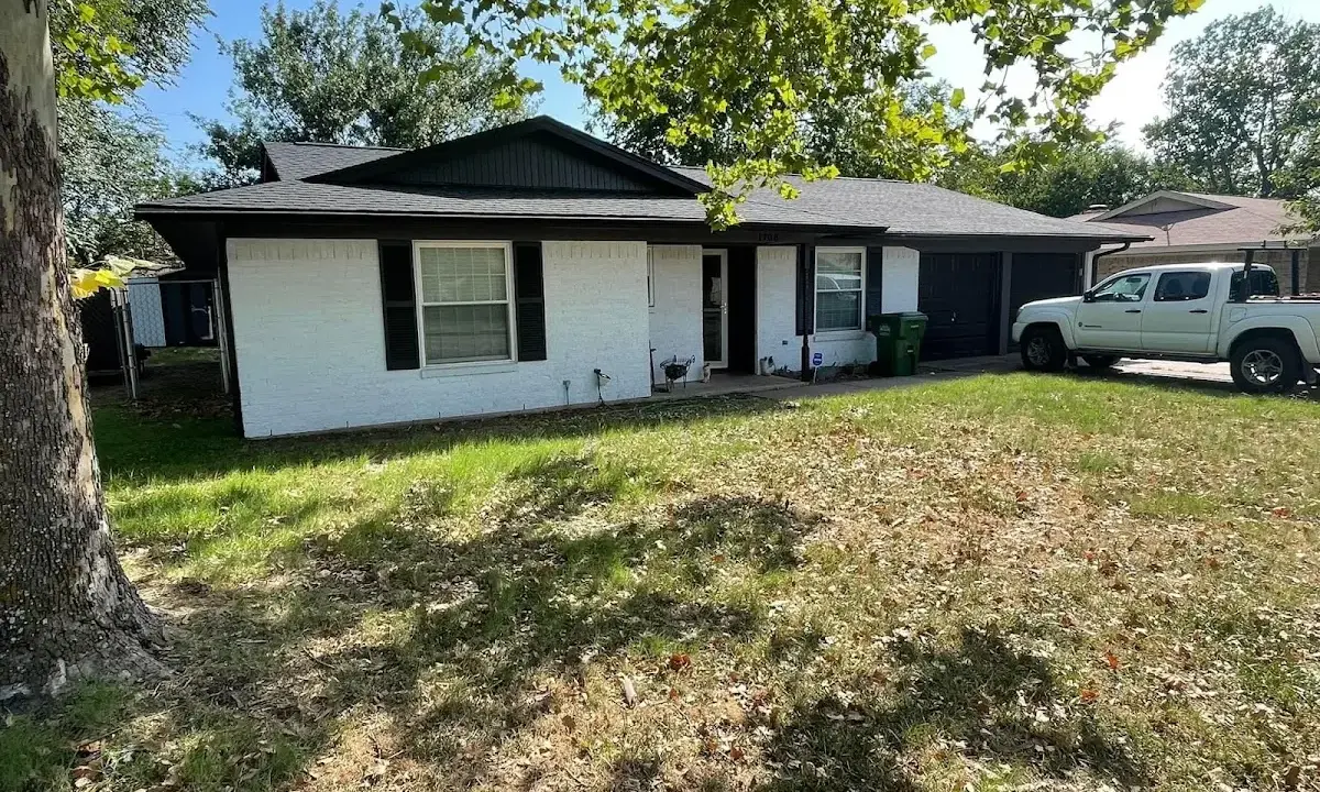 Professional roofing crew working on a residential roof in Bridgeview